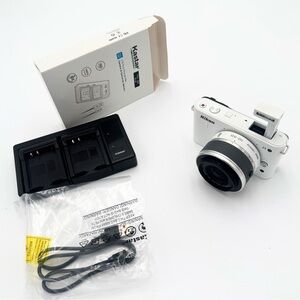 Nikon 1  J1 Nikkor Digital Camera 10-30 mm - White with new charger